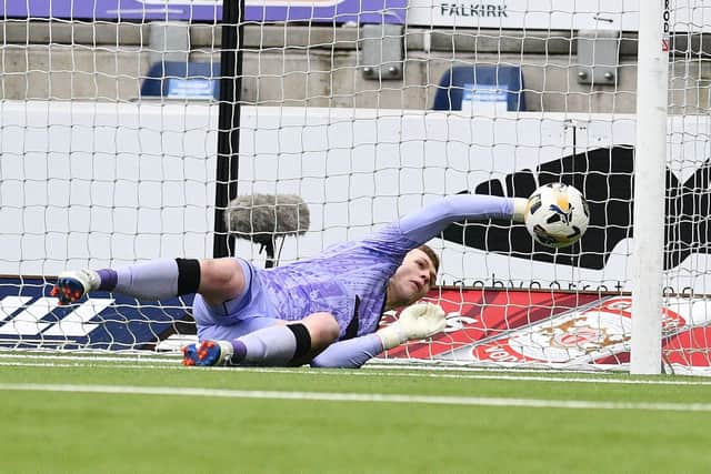 Falkirk shot-stopper Nicky Hogarth saves a shot from Raith Rovers' Finlay Pollock last Sunday (Photo: Michael Gillen)