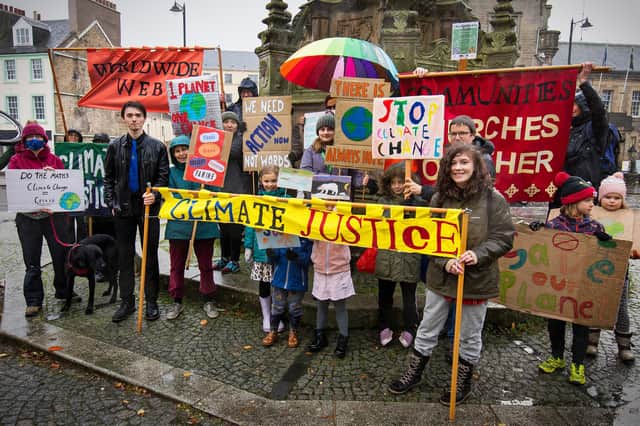 Protesters at Linlithgow Cross for the Global Day of Action for Climate Justice.
