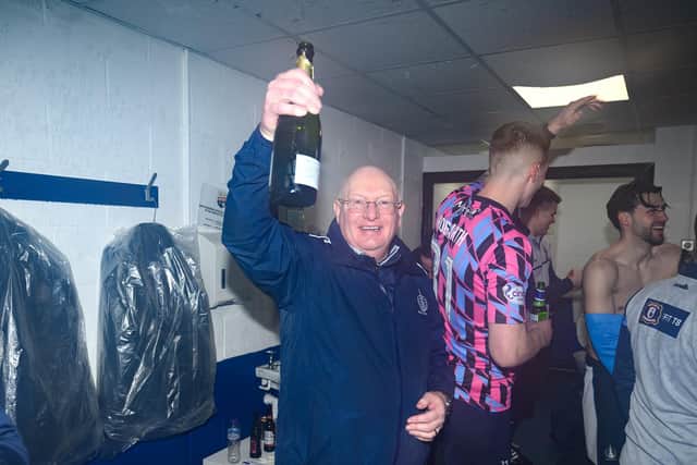 Falkirk manager John McGlynn enjoys the moment in the Falkirk changing room after leading his team to League One glory (Photo: Ian Sneddon)