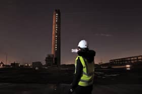 The projection on the Longannet chimney states "Make Coal History"