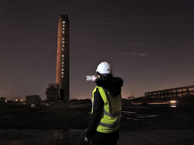 The projection on the Longannet chimney states "Make Coal History"