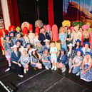 The full cast of Priscilla Queen of the Desert on the Dobbie Hall stage.