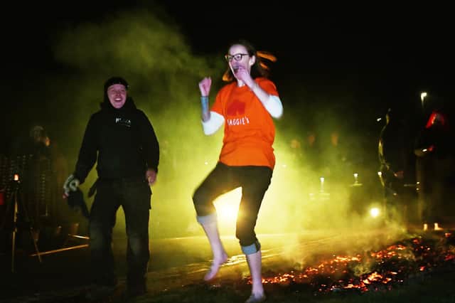 Over 20 people took part in Monday evening's charity firewalk for Maggie's Forth Valley.