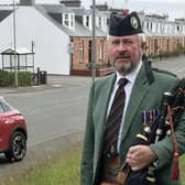 In Allandale piper Neil Clark with Provost Willian Buchanan commemorate the 80th anniversary of the Battle of St Valery