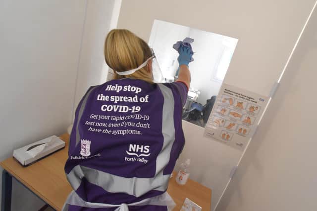 Cleaning the testing centre bays
