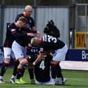 Falkirk players celebrating No 4 Ben Hall's opening goal against Clyde today, April 10 (Picture: Michael Gillen)