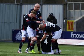 Falkirk players celebrating No 4 Ben Hall's opening goal against Clyde today, April 10 (Picture: Michael Gillen)