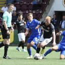 Stenhousemuir winger Euan O'Reilly is hassled by St Johnstone's Max Kucheriavyi and Cameron Ballantyne  Photo: Alan Murray)