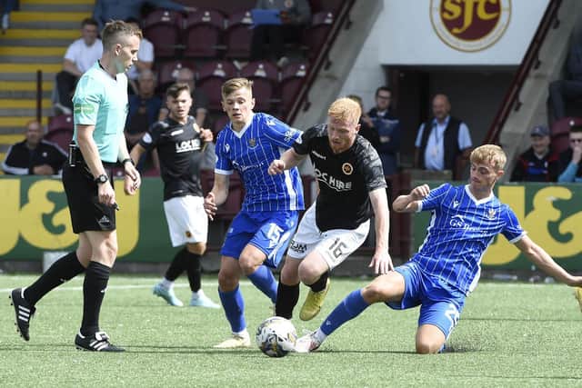 Stenhousemuir winger Euan O'Reilly is hassled by St Johnstone's Max Kucheriavyi and Cameron Ballantyne  Photo: Alan Murray)