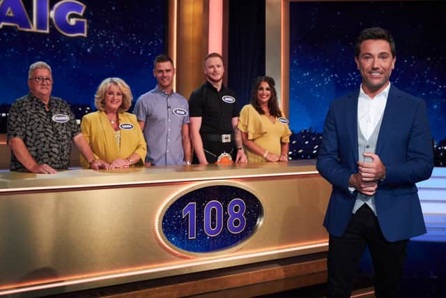 The Craig family, of Dennyloanhead, with Family Fortunes host Gino D'Acampo. Picture: Matt Frost.