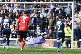 28-09-2024. Picture Michael Gillen. KIRKCALDY. Stark's Park. Raith Rovers FC v Falkirk FC. Season 2024 - 2025. SPFL William Hill Championship. Match Day 8. Goal Raith Rovers, Jack Hamilton 9 from a penalty just with Nicky Hogarth 1 getting hands to the ball.