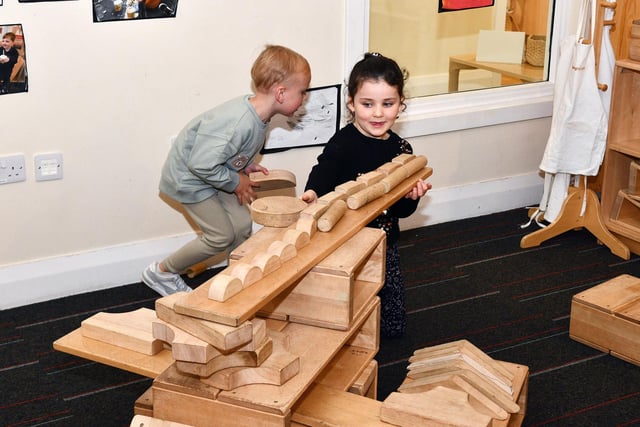 Youngsters having lots of fun while learning through play.