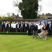 13-04-2024. Picture Michael Gillen. POLMONT. Polmont Bowling Club 150th Anniversary, memorial garden and green opening. Club members; committee; Martyn Gray, President and Ann Spiers, Vice President look on as Martyn's wife, Lauren Gray opens the green.