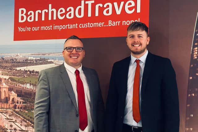 Barrhead Travel Falkirk's director Greig Avinou and sales director Kieran McVeigh celebrate the team's top award