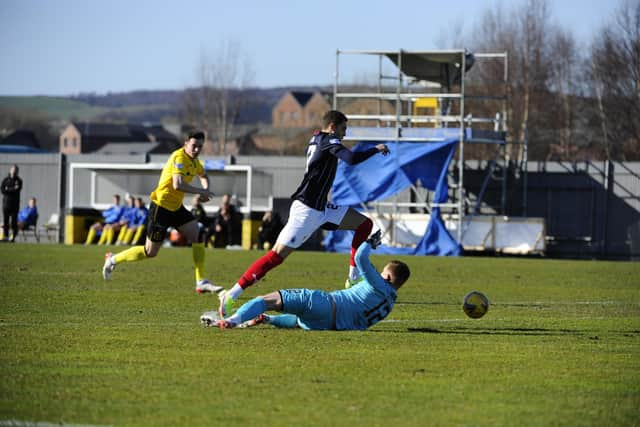 Jaze Kabia scores the opener (Pictures: Alan Murray)