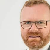 East Falkirk MP Martyn Day is fighting to stop  plans to put an end to Post Office card accounts