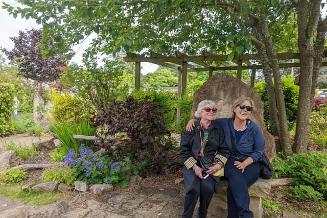 Darayn Hickingbotham with her mother Carol in the walled garden of Dollar Park.