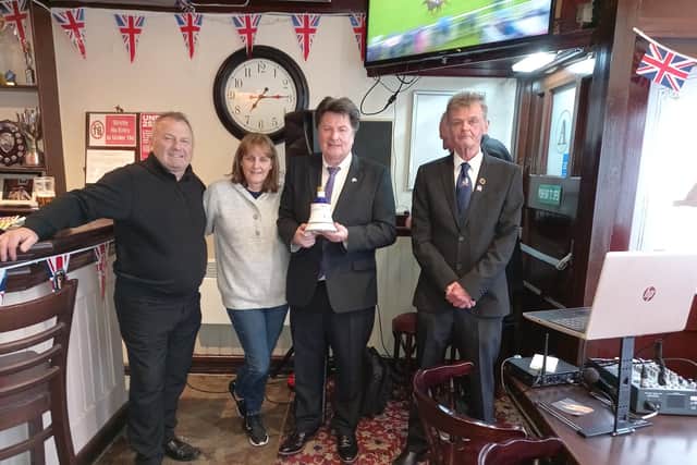 Pictured, l-r: Cllr James Kerr; Tracey Young, member of staff in Aitkens; Provost Robert Bissett; and Dougie Ferguson, a member of Bainsford War Memorial Association.
