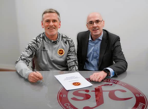 DELIGHTED DUO: Stenhousemuir boss Gary Naysmith alongside chairman Iain McMenemy after penning a new contract (Photo: Tom Frame)