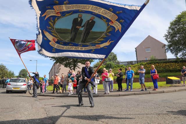 An impressive display of flag waving will once again take place as the marchers make their way through the streets