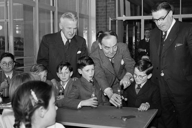 Undersecretary of State for Scotland Mr J Henderson Stewart with pupils at the new Oxgang Primary School in March 1956.