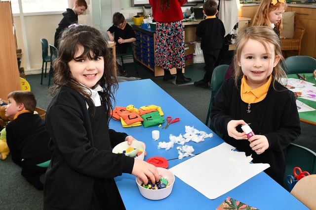 Smiling faces in their new classroom.