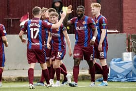 Stenhousemuir ace Nat Wedderburn celebrates scoring the Warriors’ third goal against Cove Rangers during the 3-2 League One victory with his team-mates (Pictures by Alan Murray)