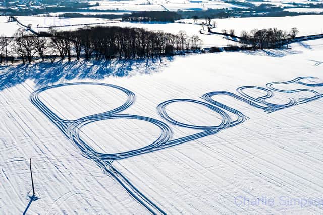 This beautiful tribute in the snow near Bo'ness was done to help make a friend smile. Photo by Charlie Simpson.