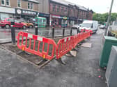 The resurfacing works have concluded and left pavements in the area 'unfinished' and, many people believe, 'unsafe' (Picture: Submitted)