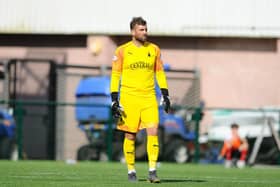 The former Falkirk stopper has hung up his gloves aged 34
