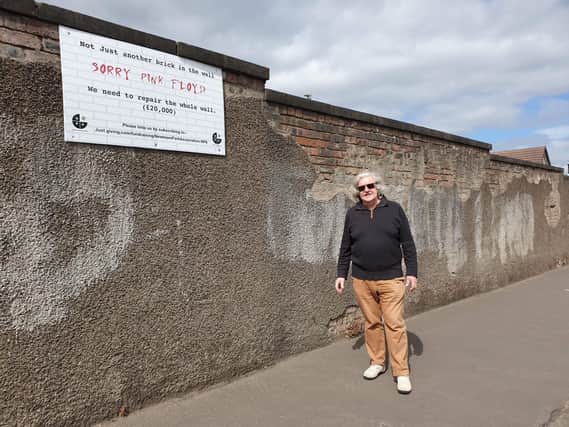 Newtown Park Association trustee Harry Waugh. The charity is trying to raise £20,000 to fund the repairs to the boundary wall. 