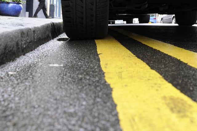 Police are reminding residents officers no longer have the powers to punish motorists who park on double yellow lines