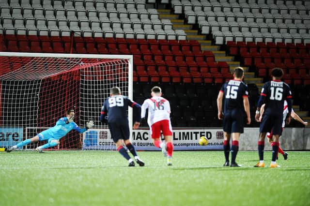 Robbie Mutch went the right way but the power and precision of Dale Carrick's 82nd minute penalty beat him and won the game for Airdrie