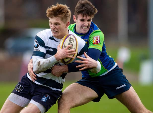 Heriot's Harry Paterson being tackled by Boroughmuir Bears' Glen Faulds during a Super6 game at Goldenacre in Edinburgh in January last year (Photo: Ross MacDonald/SNS Group/SRU)