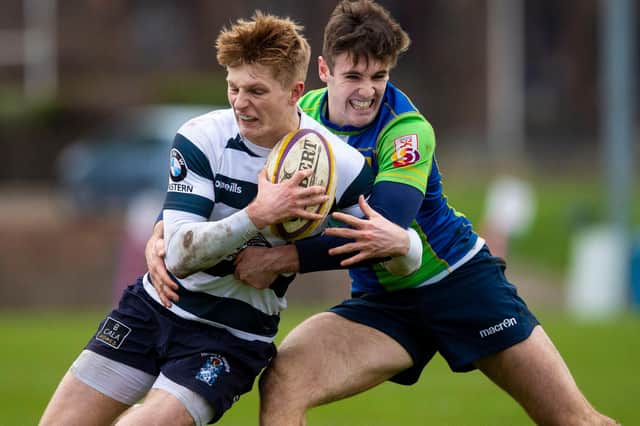 Heriot's Harry Paterson being tackled by Boroughmuir Bears' Glen Faulds during a Super6 game at Goldenacre in Edinburgh in January last year (Photo: Ross MacDonald/SNS Group/SRU)