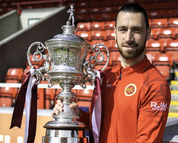 Stenhousemuir captain Gregor Buchanan with the Stirlingshire Cup trophy (Photo: Submitted by Stenhousemuir FC)