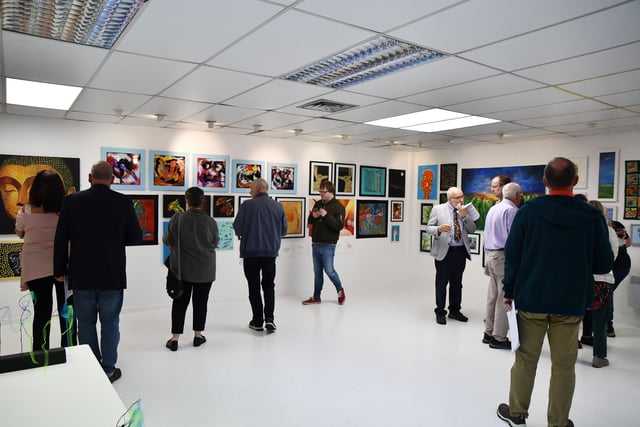 The gallery walls are filled with work by the adult students