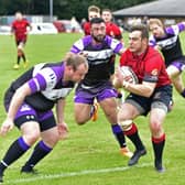 Linlithgow (wearing red) were denied a game last weekend (Library pic by Graham Black)