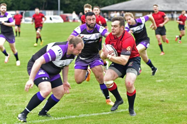 Linlithgow (wearing red) were denied a game last weekend (Library pic by Graham Black)