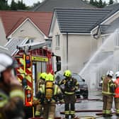 Emergency services were called to a fire involving a gas box on the outside of a property in Redding's Grant Drive on Wednesday afternoon.  (Pic: Michael Gillen)