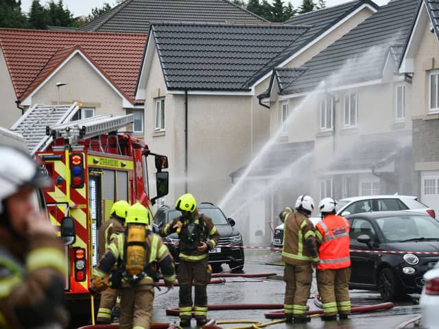 Emergency services were called to a fire involving a gas box on the outside of a property in Redding's Grant Drive on Wednesday afternoon.  (Pic: Michael Gillen)
