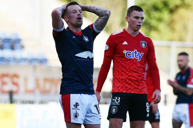Gary Oliver (left) will miss FC Edinburgh game this weekend (Pic Michael Gillen)
