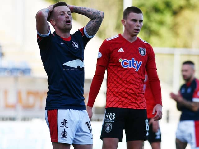 Gary Oliver (left) will miss FC Edinburgh game this weekend (Pic Michael Gillen)
