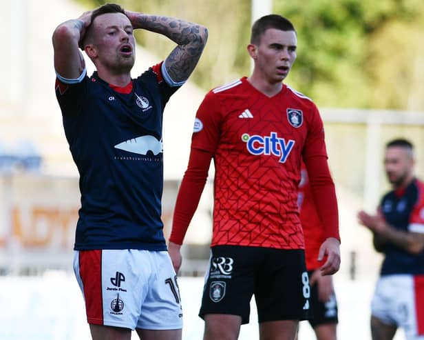 Gary Oliver (left) will miss FC Edinburgh game this weekend (Pic Michael Gillen)