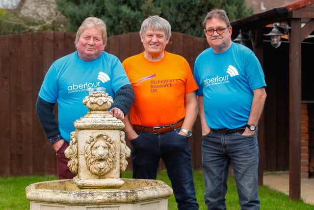 Taking part in the Rickshaw run 2022  next month are, left to right, John Henderson, George Rigby and Bill Cook