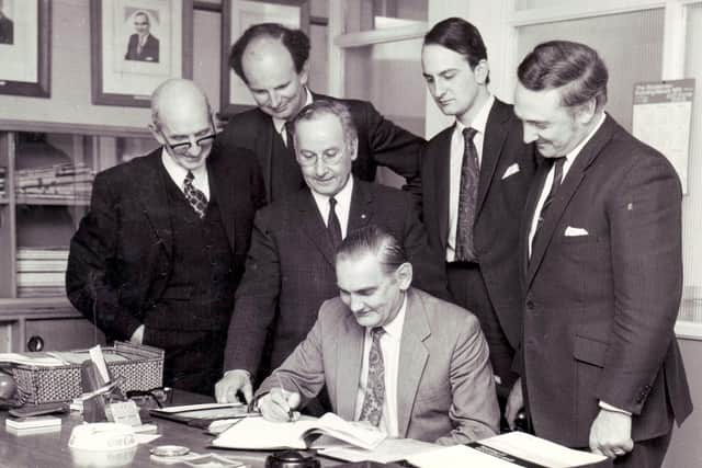 Freddy Johnston and his management team on the day F.Johnston & Co took over Strachan & LivingstonLivingston.