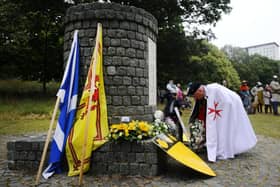 Councillors will decide on a proposal to add signage to the Battle of Falkirk memorial in Callendar Park where a service takes place annually