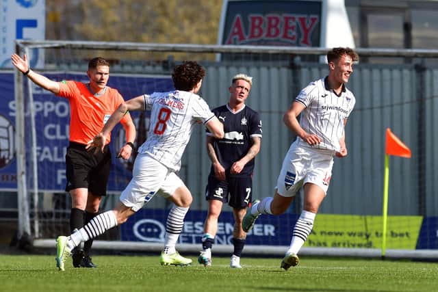 Dunfermline's Lewis McCann wheels away to celebrate after levelling the match at 2-2 against Falkirk (Pictures by Michael Gillen)