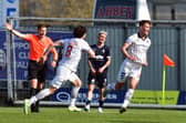 Dunfermline's Lewis McCann wheels away to celebrate after levelling the match at 2-2 against Falkirk (Pictures by Michael Gillen)