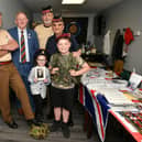Veterans Together (Forth Valley) organised a VE Day 80 event and are pictured with Frankie and Riley Sneddon from Bo'ness holding a photograph of their great grandfather, Francis Morgan, who served with the 7th Armoured Division of the British Army, Desert Rats.